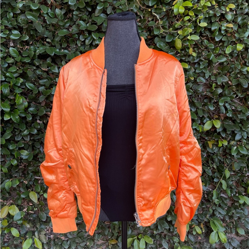 Orange bomber jacket